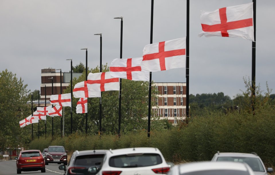 Photo credit: The Sun, 'Defiant locals vow to hang hundreds of St George’s flags across UK after councils sparked fury by tearing them down'